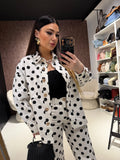Completo pois camicia e pantalone
