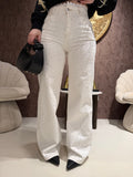 Jeans con brillantini e pizzo bianco
