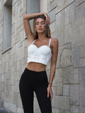 Top bianco con strass argento