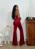 Tuta rossa con incrocio e frange in strass