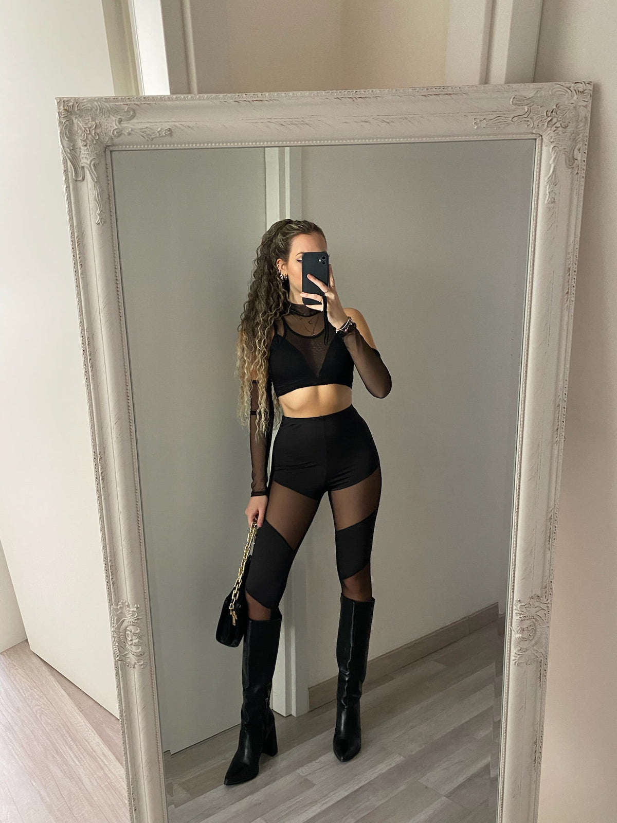 Pantalone nero con trasparenze