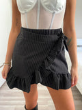 Completo giacca e gonna gessato nero