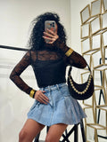 Maglia in pizzo collo alto