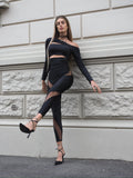 Maglia nera con spacchi