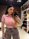 Polo in cotone con cuore ricamato