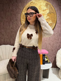 Maglione con fiocchi