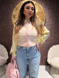 Gilet a righe con bottoni cuore