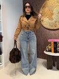 Jeans con risvolto e strass