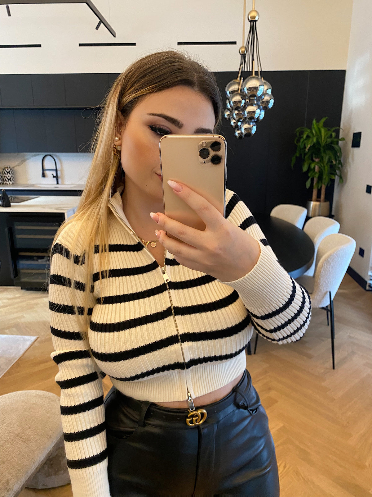 Maglione a righe con zip