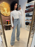Blusa monospalla drappeggiata