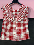 Top a quadri con scollo