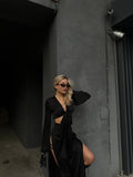 Set top e pantaloni con spacchi nero