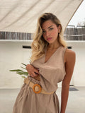 Completo smanicato e short Camel