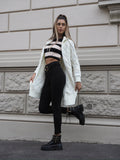 Cardigan bianco a trecce