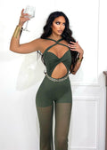 Tuta verde militare con incroci e pantalone con trasparenze