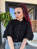 Camicia con fiori ricamati
