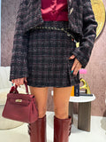 Completo in tweed nero bordeaux
