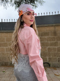 Camicia rosa con pizzo bianco