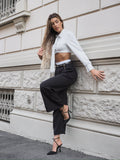 Pantalone nero con dettaglio bianco