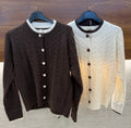 Maglione a trecce con cuori