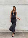 Abito midi nero con gioiello