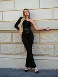 Tuta monospalla nera glitter con cintura
