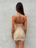 Abito gold con gioiello push up