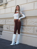 Pantalone choco con cintura oro