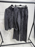 Completo con felpa over e brillantini pantalone a zampa