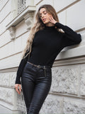 Maglione nero collo alto