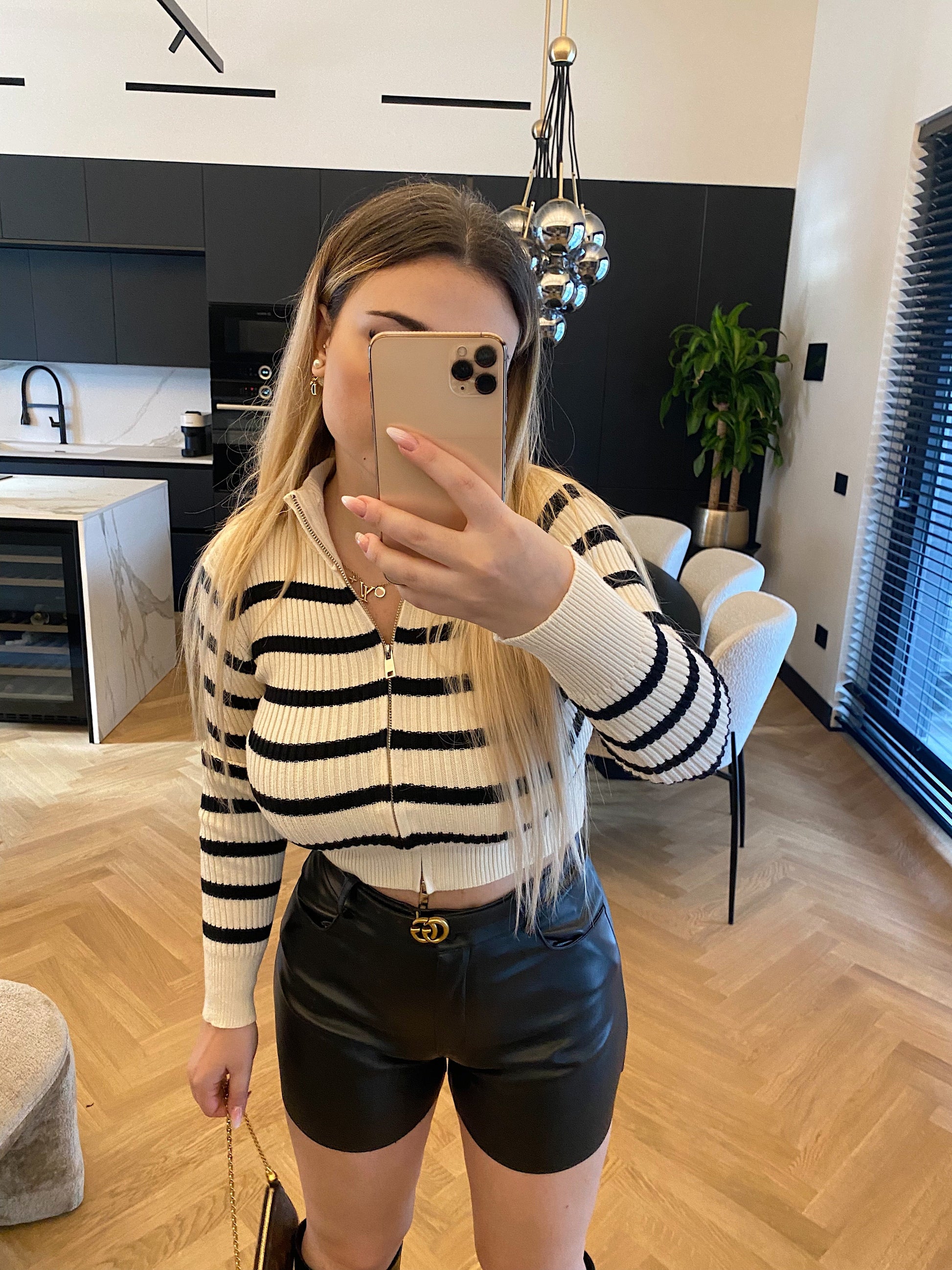 Maglione a righe con zip