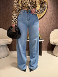 Jeans con tasca glitter maculata
