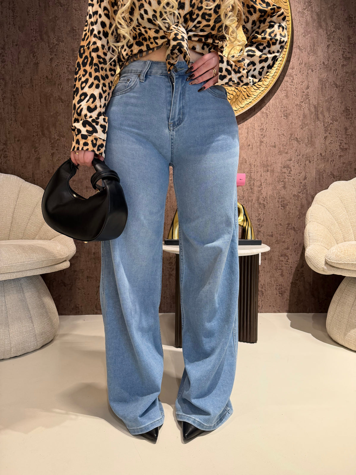 Jeans con tasca glitter maculata