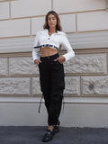 Camicia crop con cintura