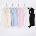 Blusa con gioiello