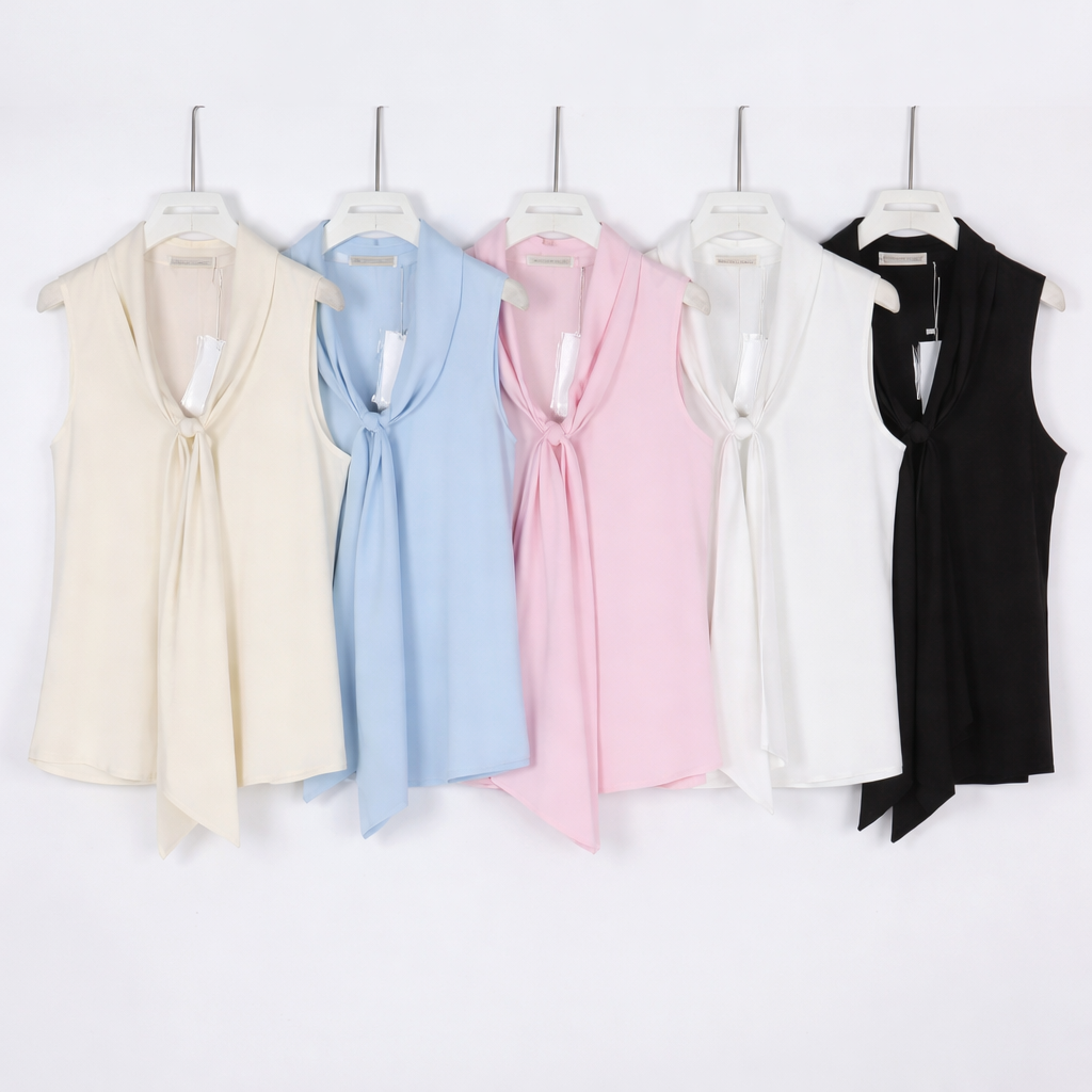 Blusa con gioiello