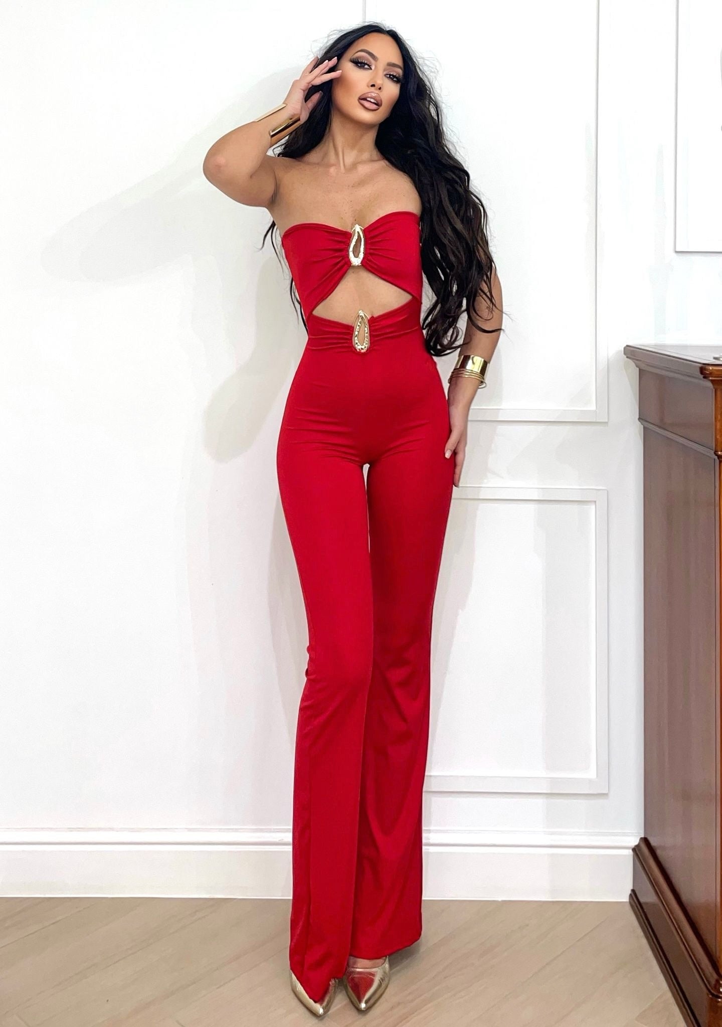 Tuta a fasce rosso con gioielli flame