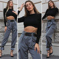 Pantalone grigio con cinghie