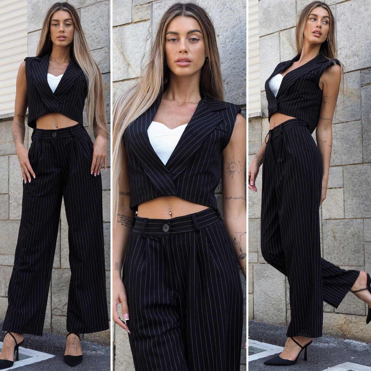 Completo smanicato e pantalone gessato nero