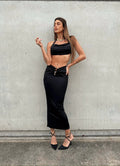 Completo top e gonna nero con gioiello
