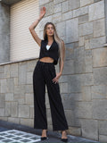 Completo smanicato e pantalone gessato nero
