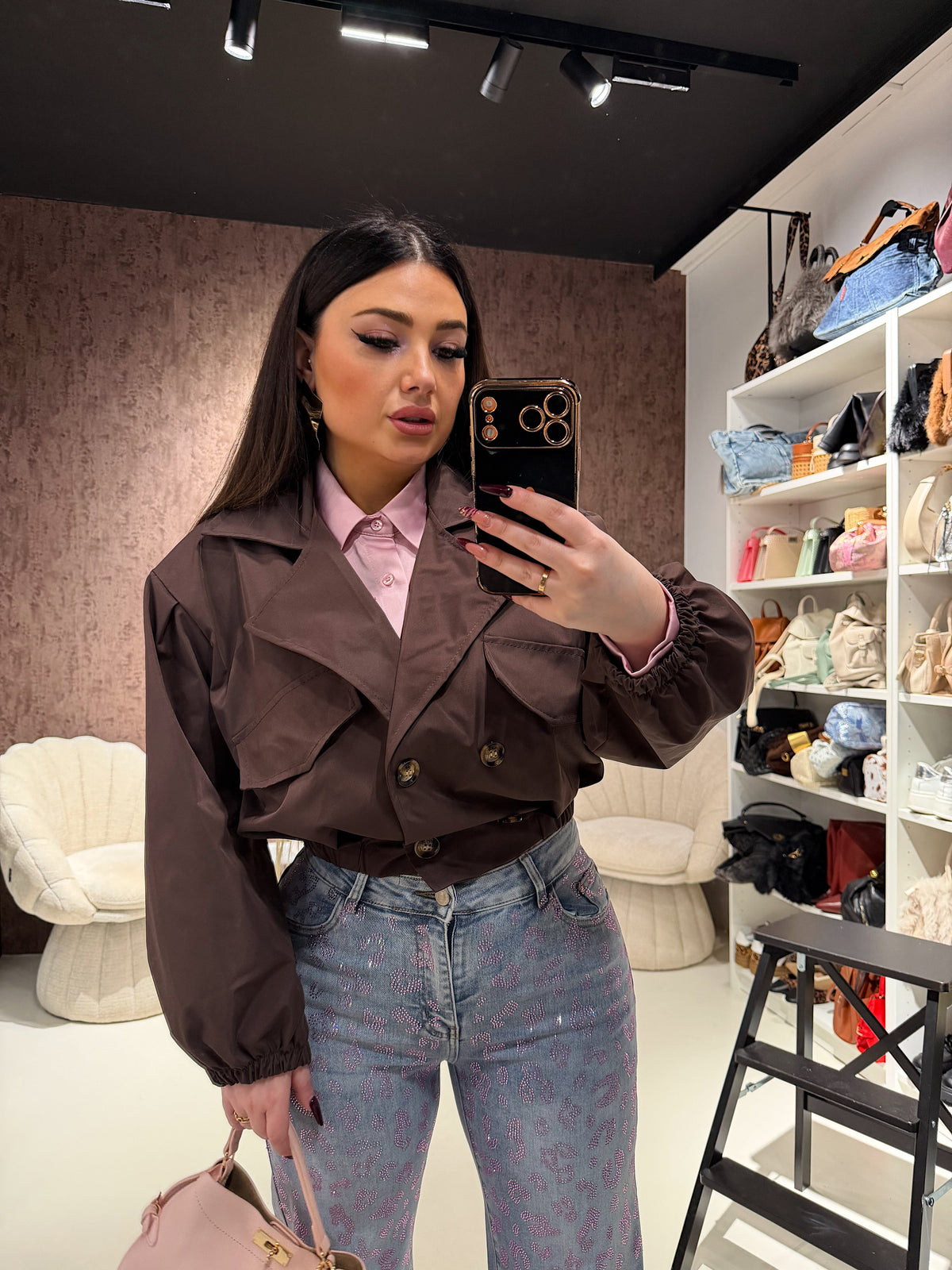 Trench con elastico