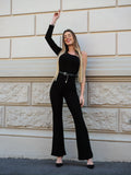 Tuta monospalla nera glitter con cintura