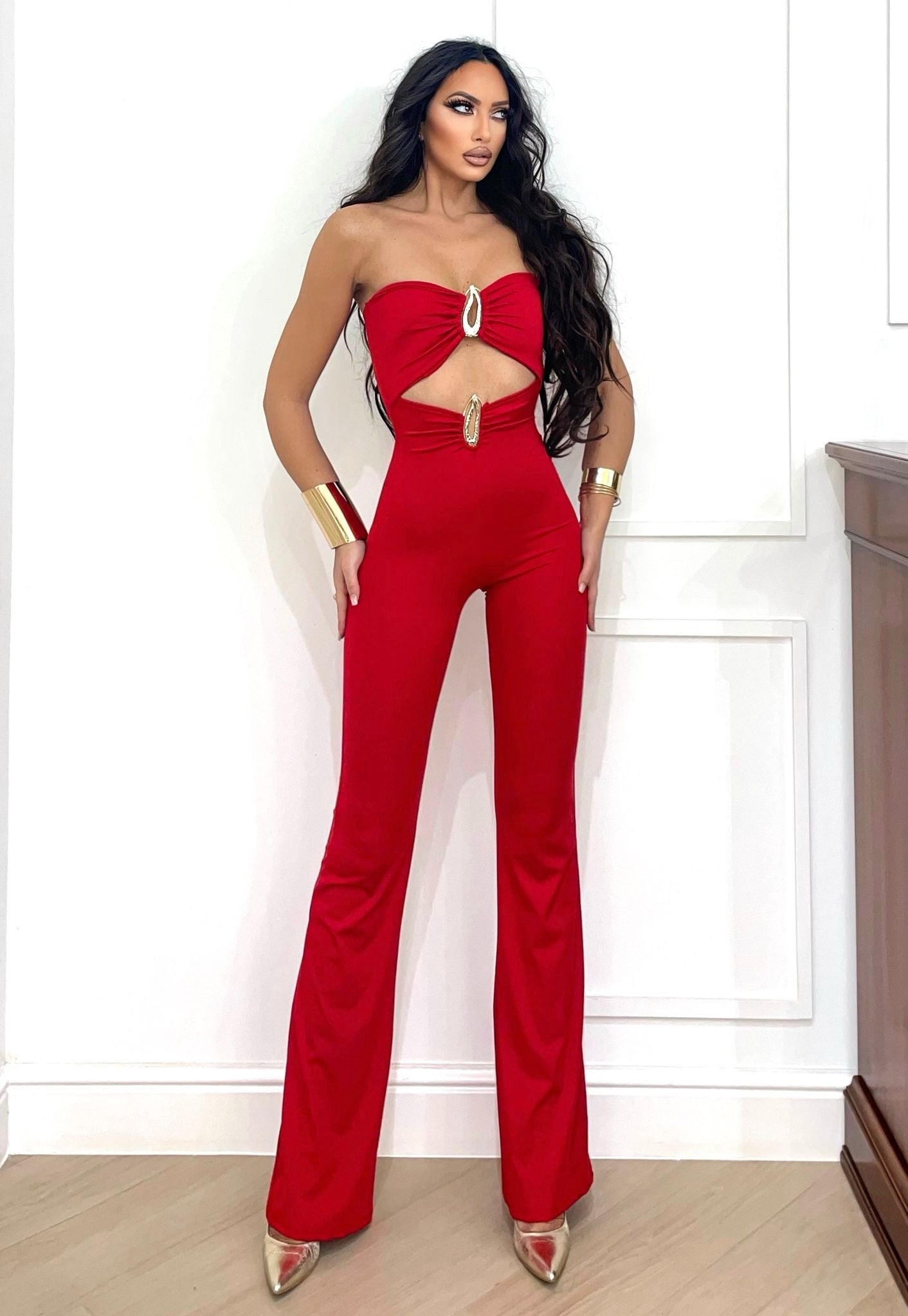 Tuta a fasce rosso con gioielli flame