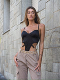 Body nero sgambato con gioiello