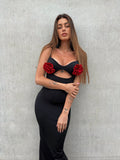 Abito aderente con rose rosse