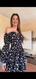 Abito con fiorellini schiena incrociata