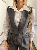 Completo smanicato e pantalone grigio