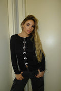 Maglia nera con fiocchetti
