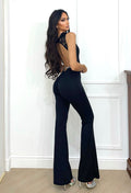 Tuta nera con push up smanicata in pizzo
